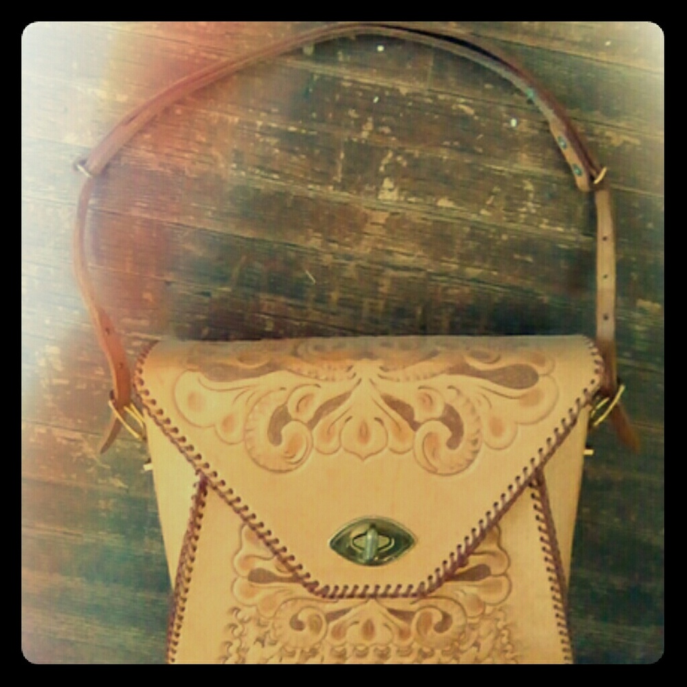 Vintage Clifton hand tooled leather purse.